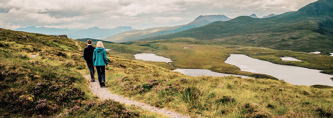 couple hiking in scotland
