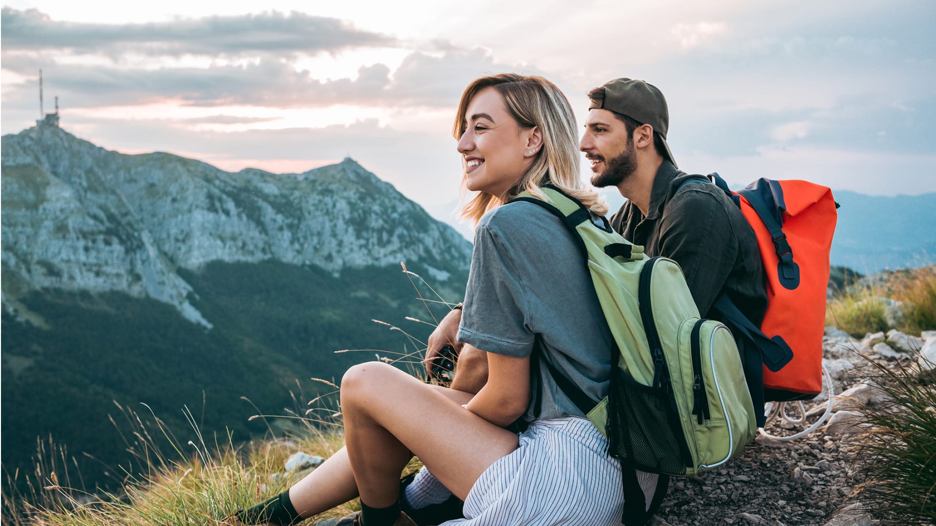 couple on mountain enjoying the view