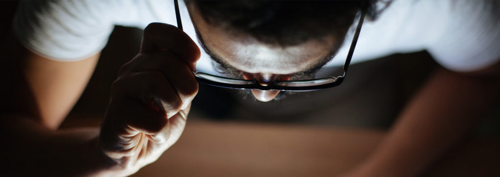 man looking at computer