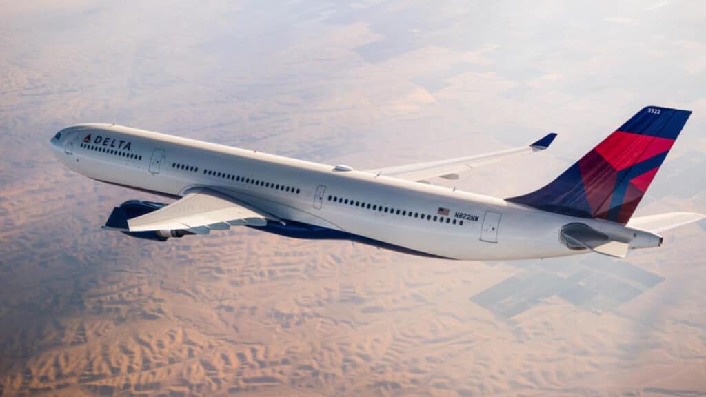 Delta plane flying over desert