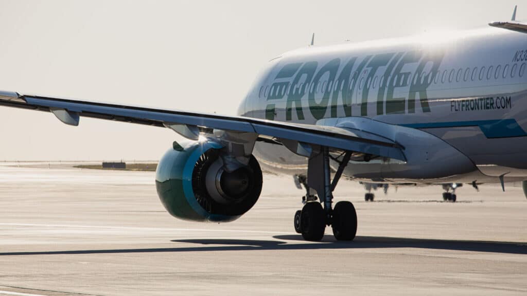 Frontier airplane on ground at airport