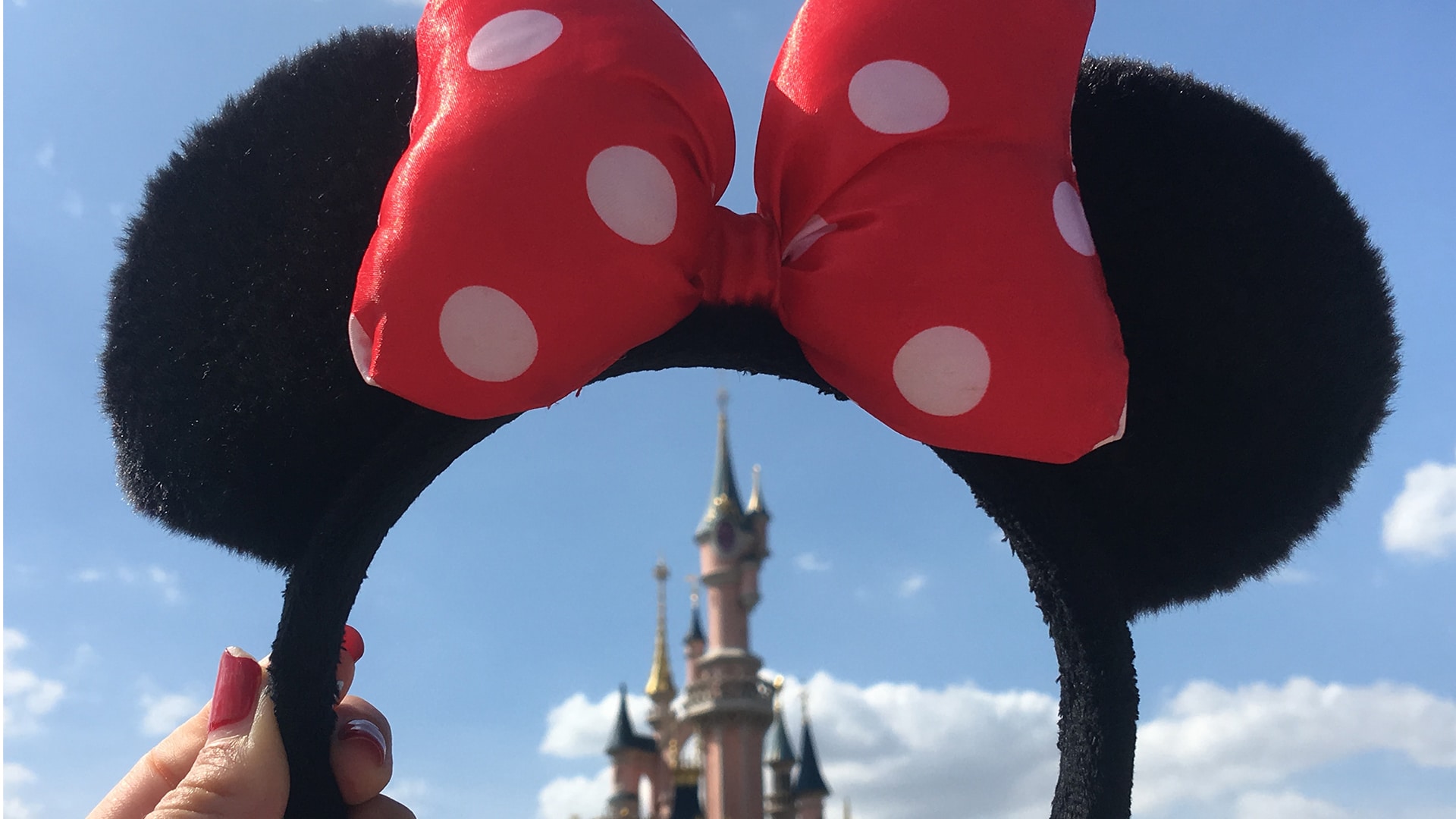 minnie ears over disney castle