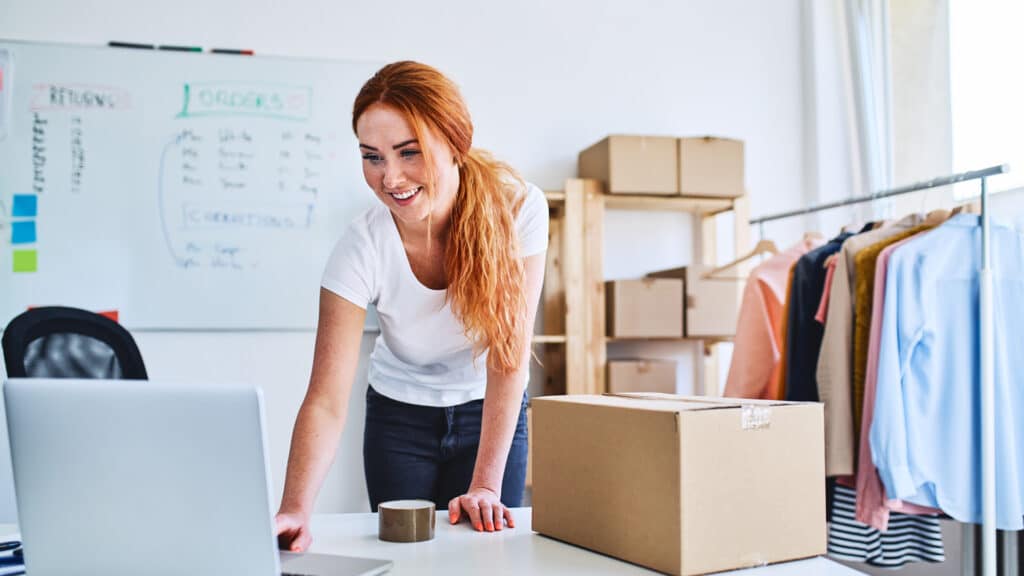 self employed woman on computer in home office