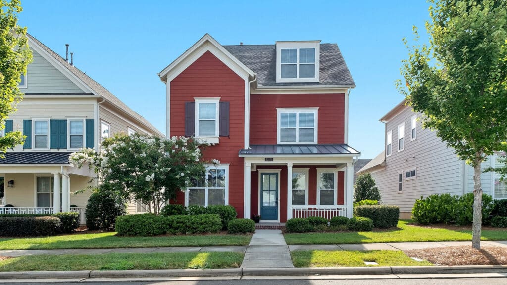 little red house on neighborhood street