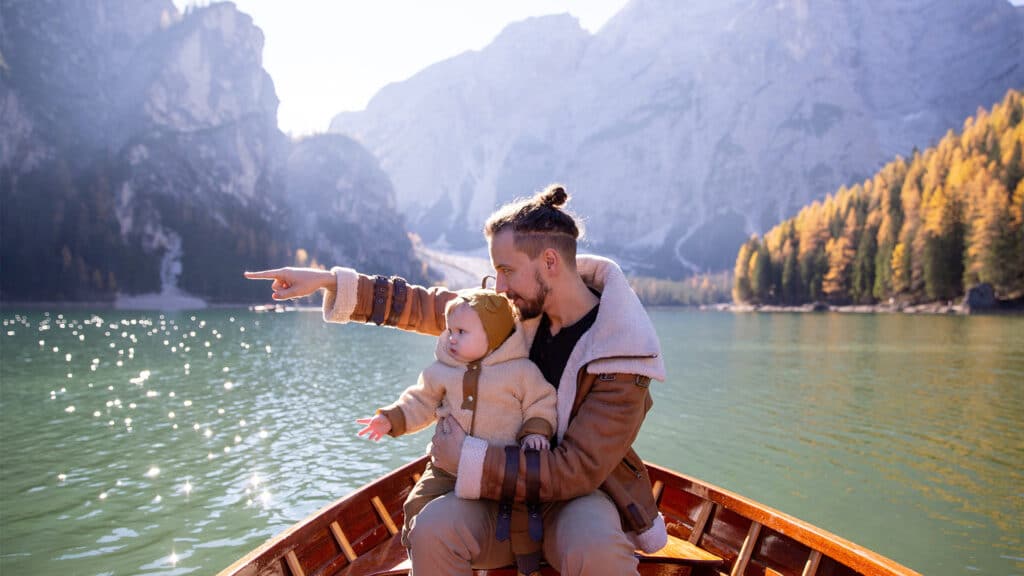 father and child on boat