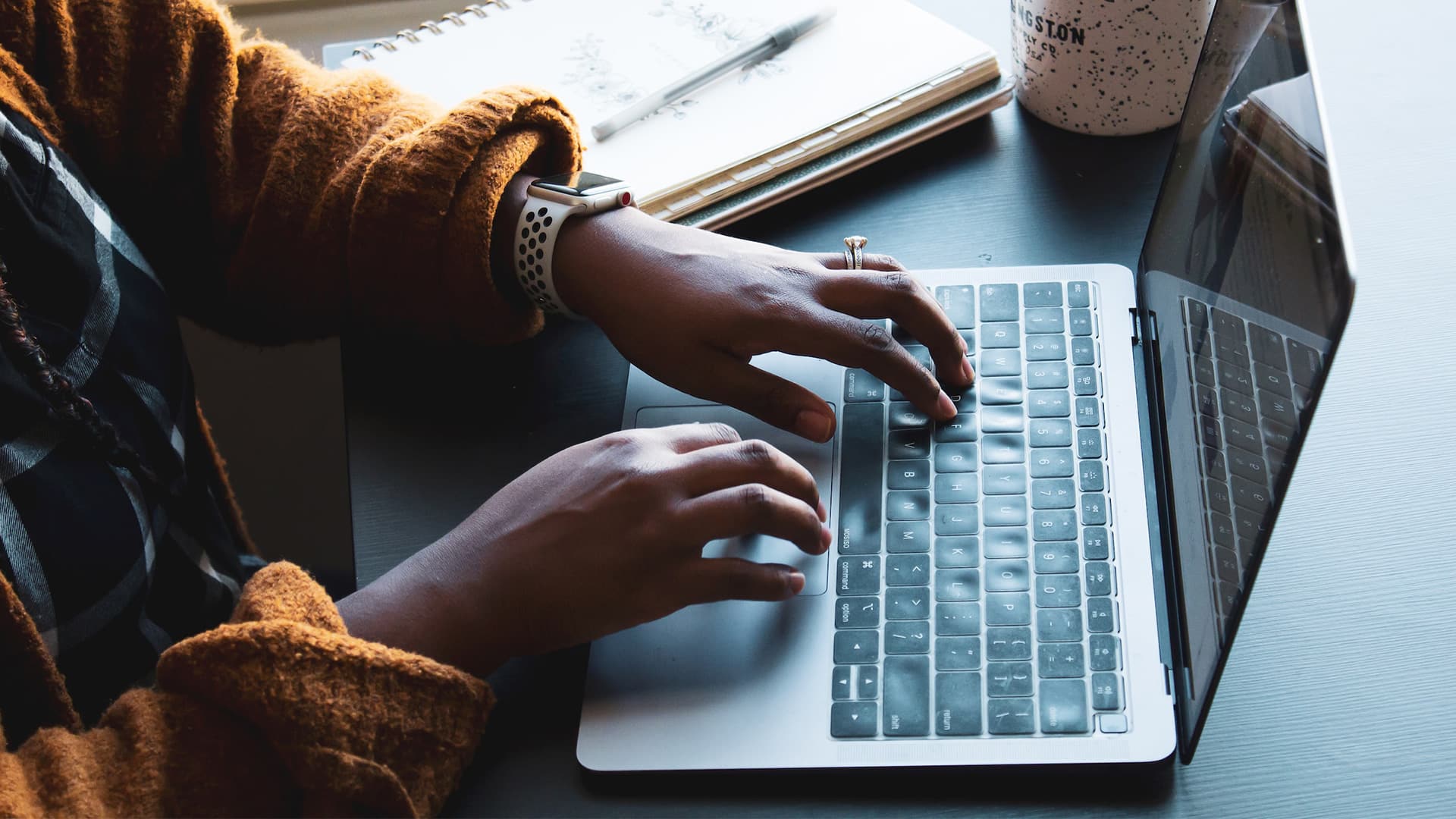 person using laptop