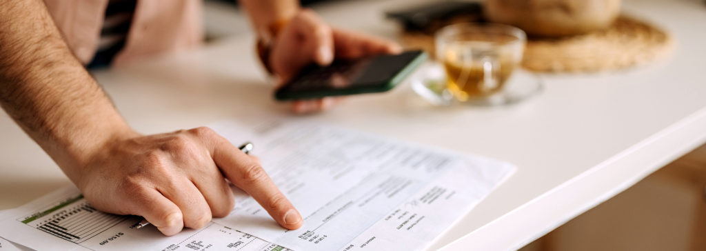 man working on expenses