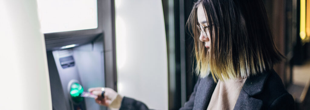 woman using atm