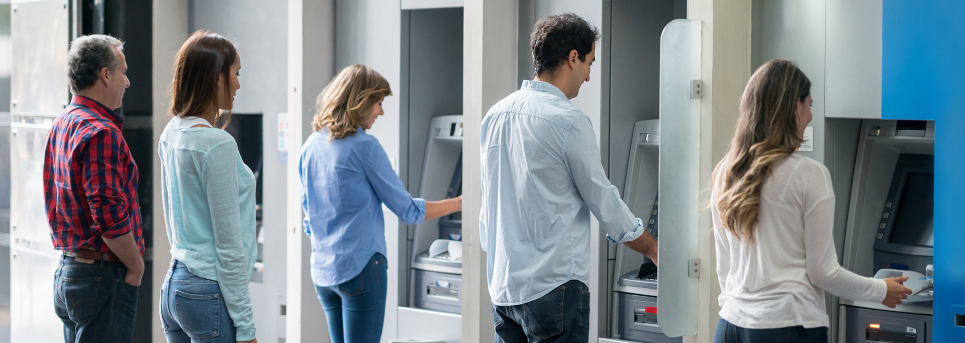 people in line at atm