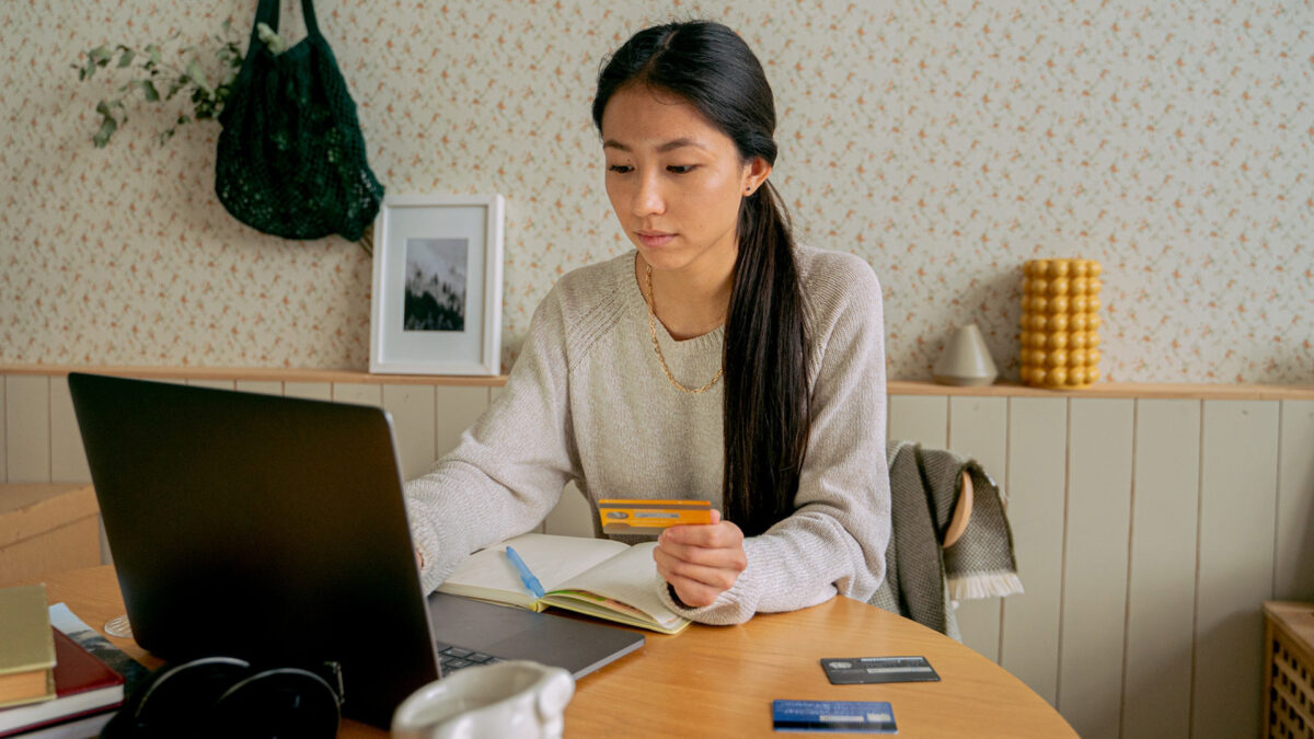 woman paying credit cards online