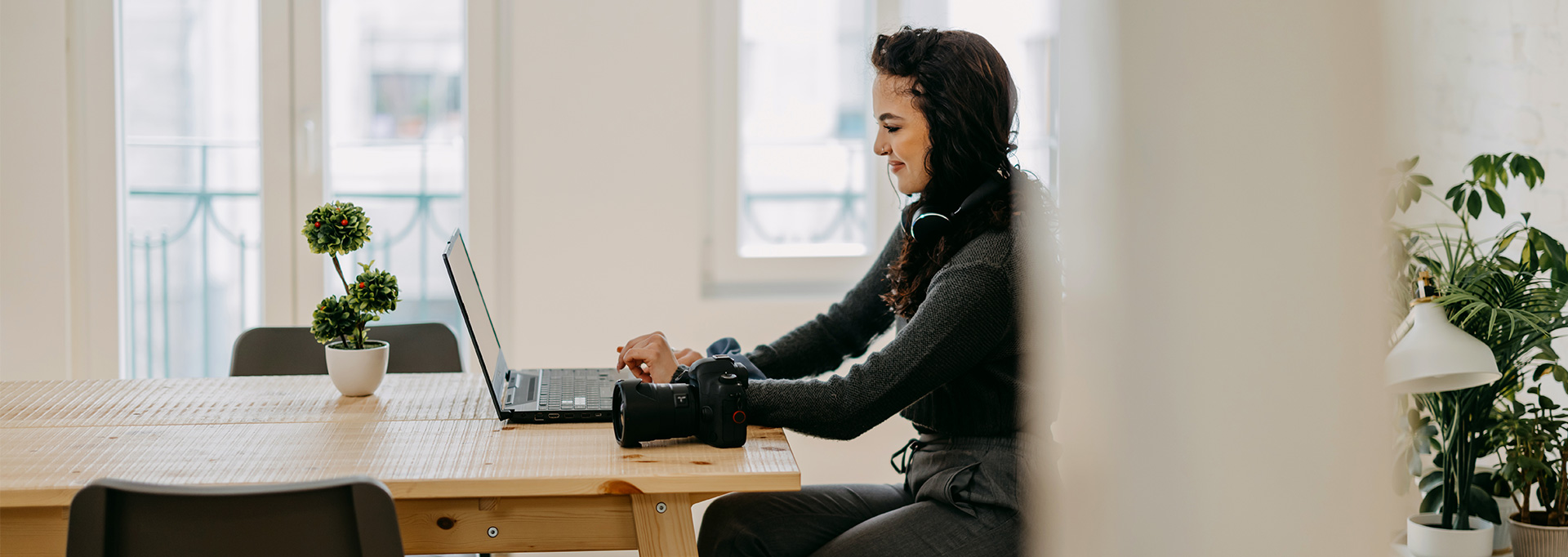 photographer working on computer at home