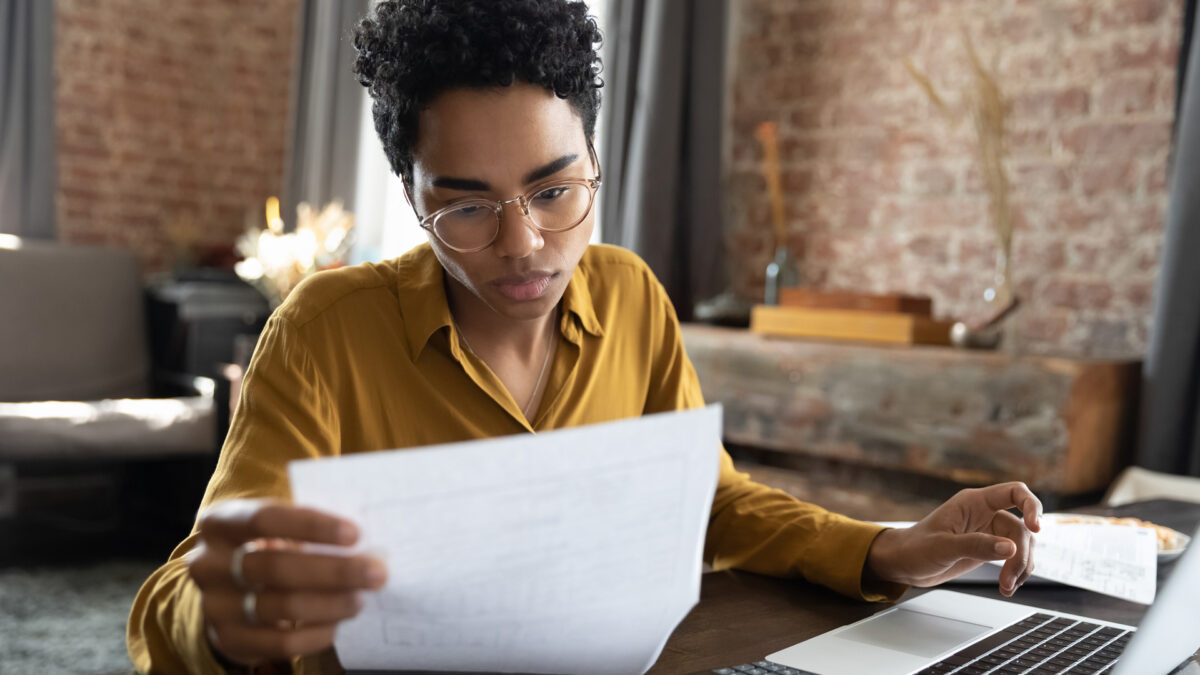 woman looking at finances